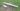 Skyeye 5000mm carbon fiber fixed wing UAV drone on grassy field.