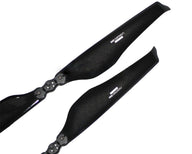 Black carbon fiber drone propellers for VTOL and fixed-wing UAVs, labeled MAD COMPONENTS